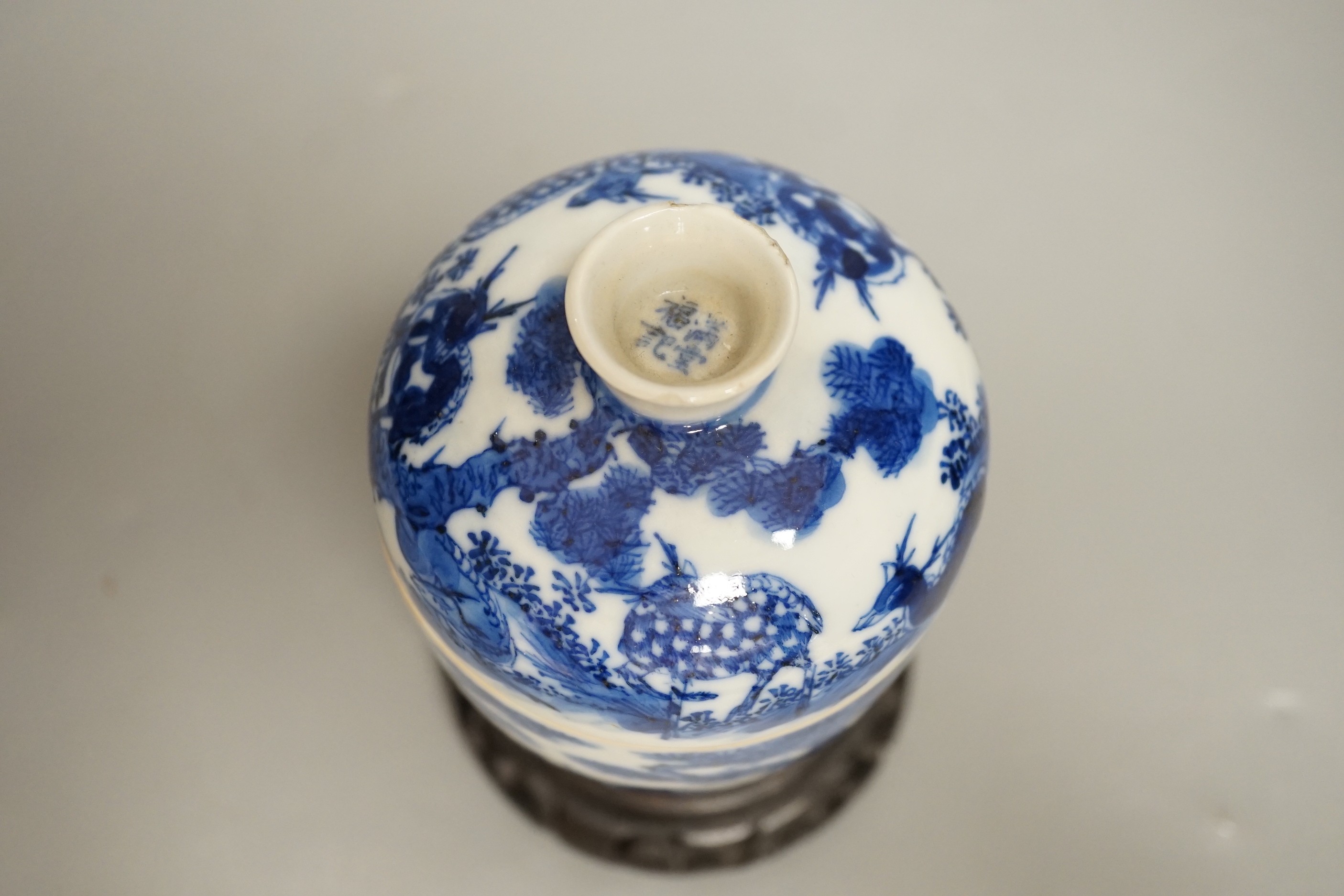 A 19th century Chinese blue and white ‘eight deer’ bowl and cover, ‘man tang fu ji’ mark, 12cm excluding wood stand